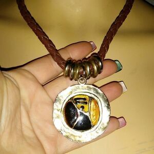 Vintage leather braided with gold and silver penda